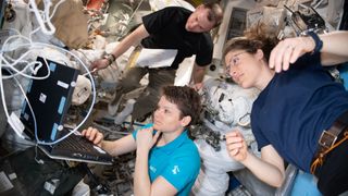 NASA astronauts Anne McClain, Christina Koch and Nick Hague conduct spacesuit maintenance in the Quest airlock of the International Space Station. Like most Americans on Earth, astronauts has to file their taxes for 2018 by April 15, 2019.