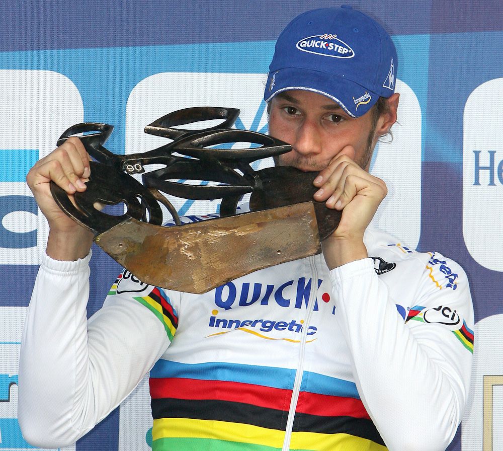 Tom Boonen (Quick Step) kisses the trophy on the podium after winning the 90th Tour of Flanders in 2006.