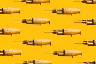 a group of injection needles on a yellow background