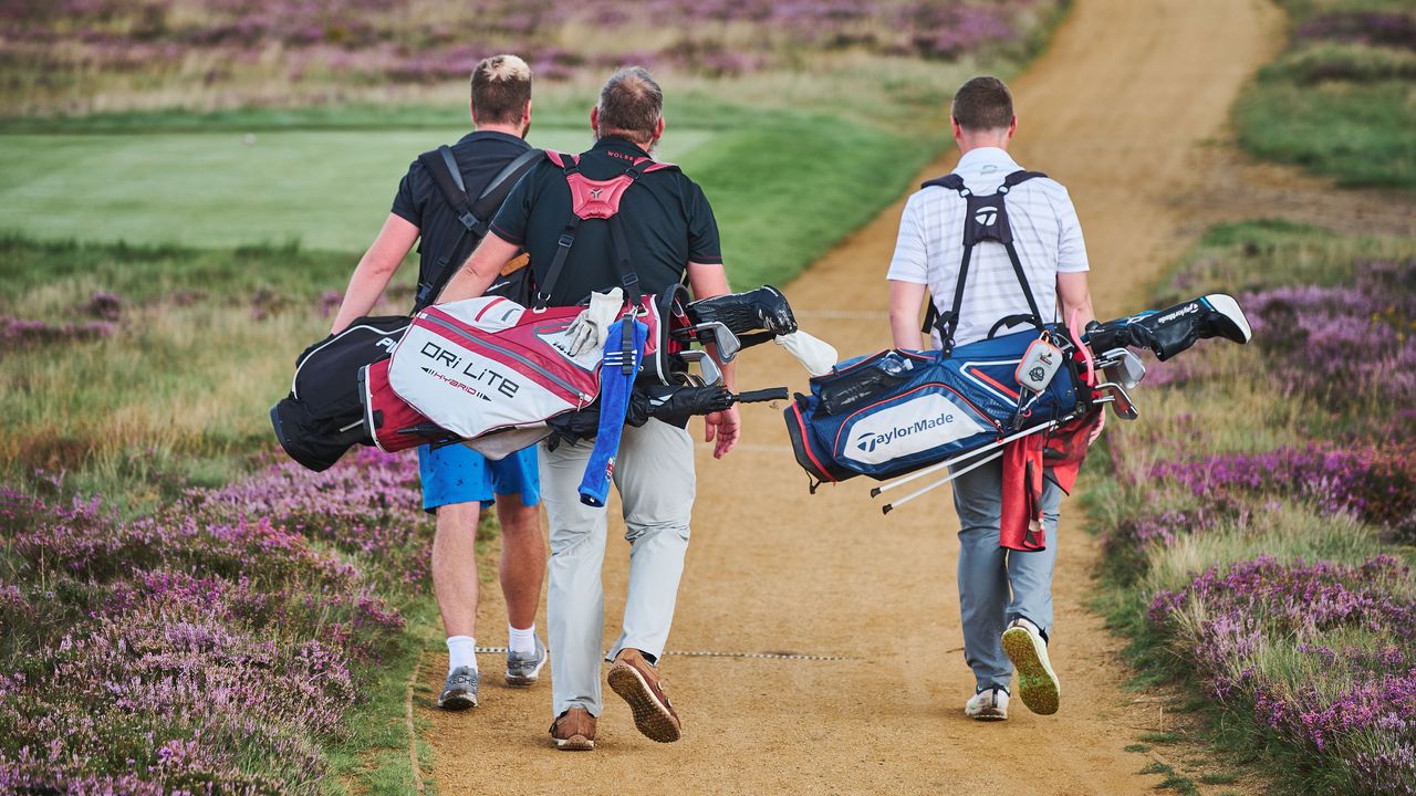 golfers walking and taking 