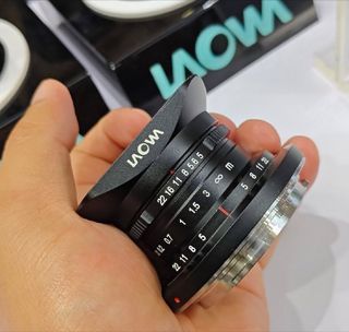 Laowa lenses in a hand