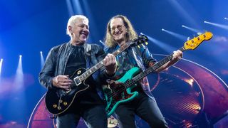 Alex Lifeson (L) and Geddy Lee of Rush perform in concert during the "Rush: Fifty Something" tour at Dickies Arena on July 11, 2026 in Fort Worth, Texas