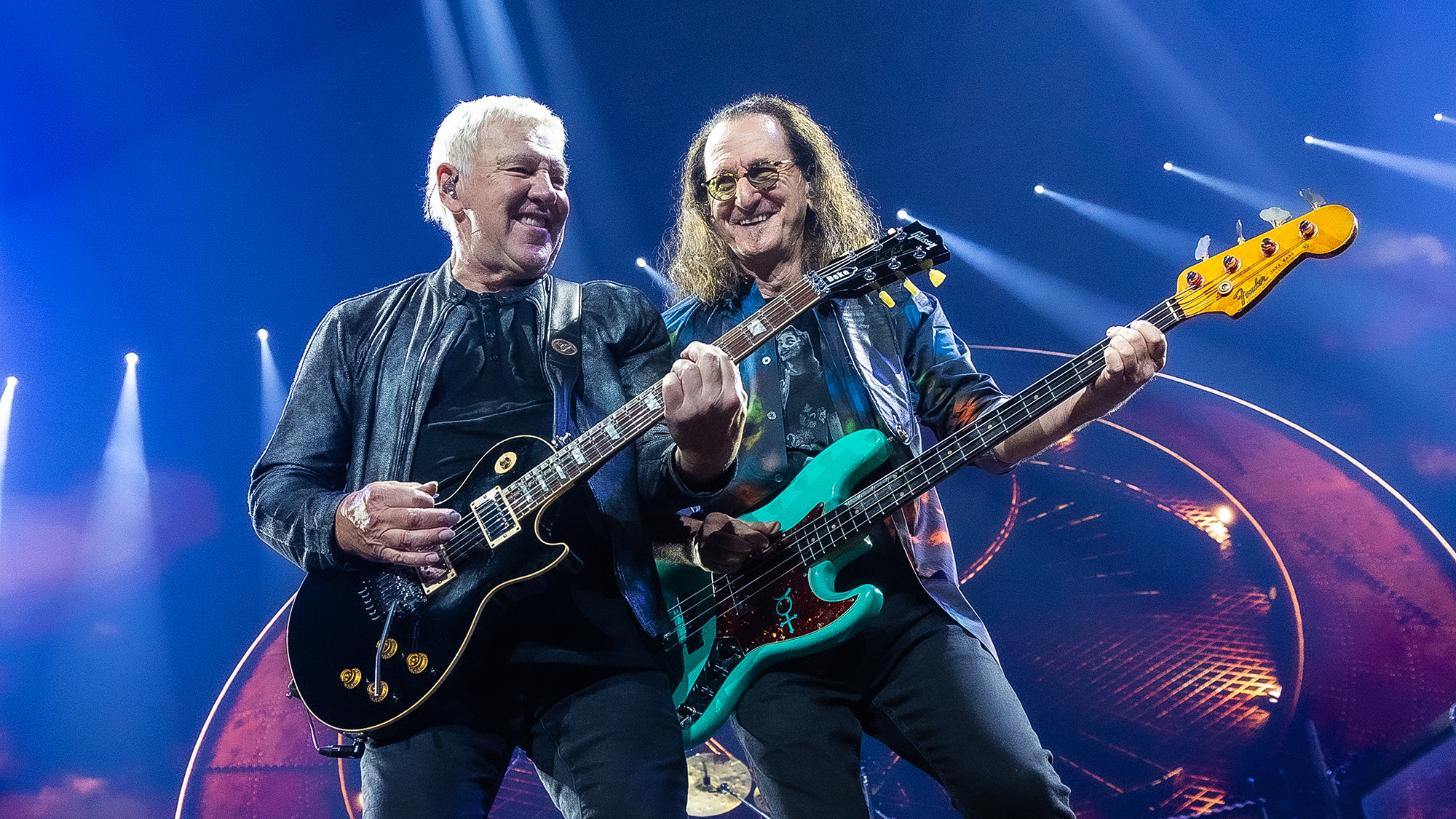  Alex Lifeson (L) and Geddy Lee of Rush perform in concert during the "Rush: Fifty Something" tour at Dickies Arena on July 11, 2026 in Fort Worth, Texas