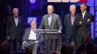Former U.S. Presidents Jimmy Carter, George H.W. Bush, George W. Bush, Bill Clinton and Barack Obama address the audience during the "Deep from the Heart: The One America Appeal Concert" at Texas A&M University on Oct. 21, 2017. 