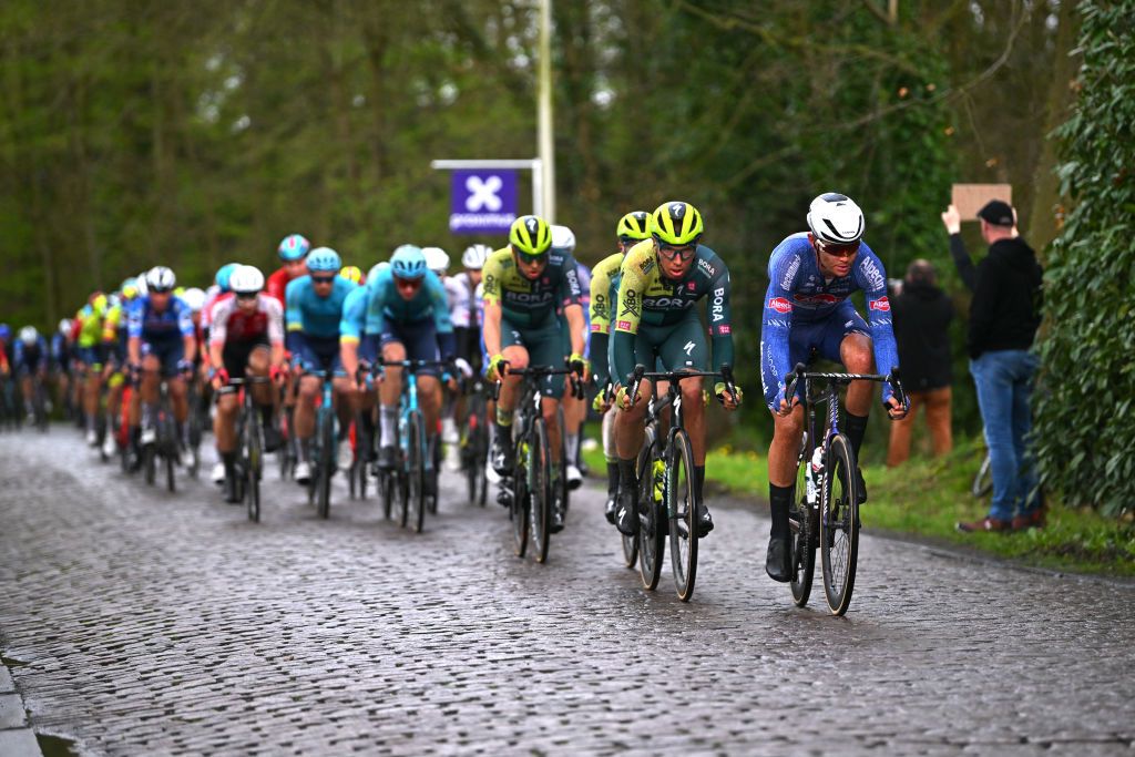 SCHOTEN BELGIUM APRIL 03 LR Filip Maciejuk of Poland and Team BORA hansgrohe and Senne Leysen of Belgium and Team Alpecin Deceuninck compete during the 112th Scheldeprijs 2024 Mens Elite a 2053km one day race from Terneuzen to Schoten on April 03 2024 in Schoten Belgium Photo by Luc ClaessenGetty Images