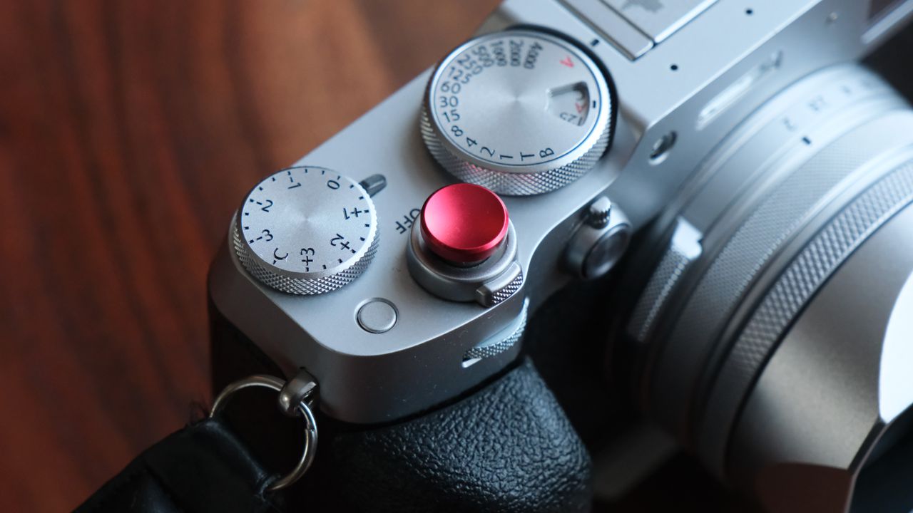 Fujifilm X100VI camera on a wooden table