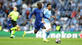 Chelsea's N'Golo Kante is pursued by Manchester City's ilkay Gundogan during the 2021 Champions League final in Porto.