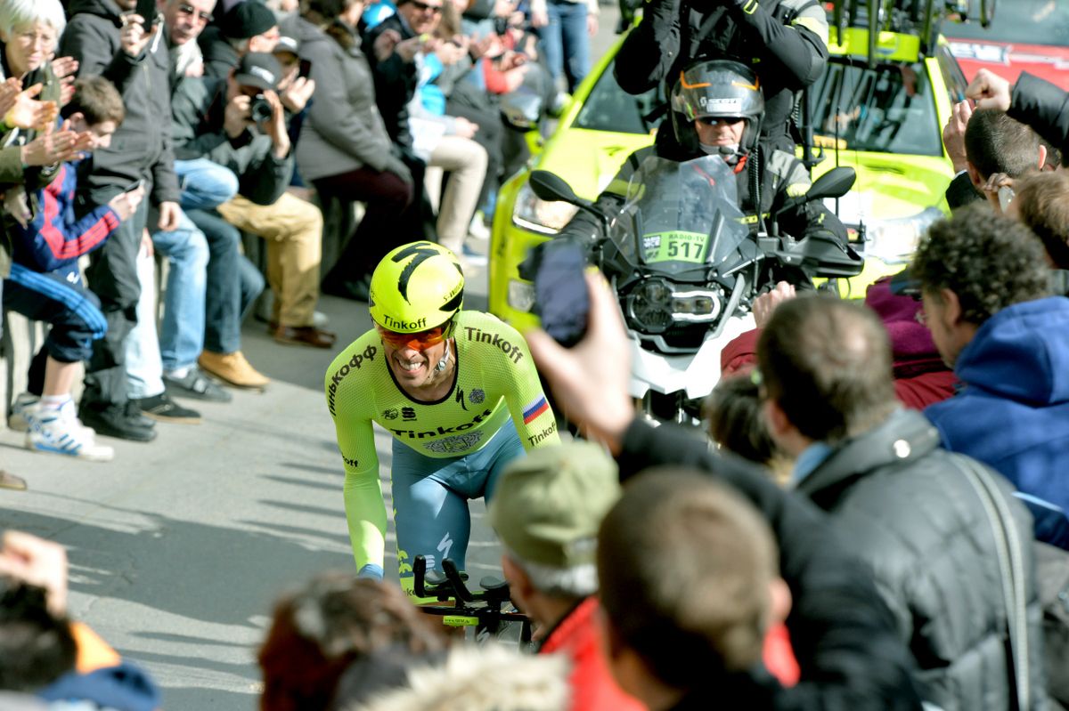 Alberto Contador riding through the crowds
