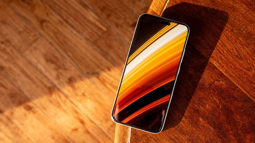 The Honor Magic 8 Pro with a planetary ring wallpaper from the Backdrops app