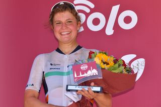 SIENA ITALY AUGUST 01 Podium Leah Thomas of The United Statesand Team Equipe Paule Ka Celebration Trophy Flowers during the Eroica 6th Strade Bianche 2020 Women Elite a 136km race from Siena to Siena Piazza del Campo StradeBianche on August 01 2020 in Siena Italy Photo by Luc ClaessenGetty Images