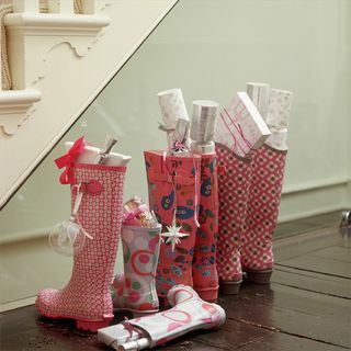wellie stockings with gifts and crackers