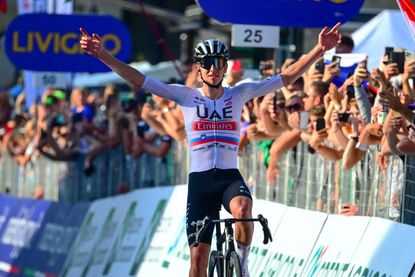 Tadej Pogačar celebrates victory in Bergamo