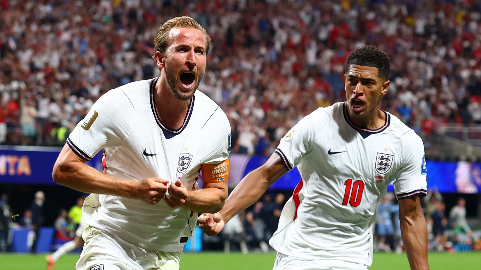Harry Kane (L) of England celebrates scoring his side's first goal with team-mate Jude Bellingham during the FIFA World Cup 2026 Round Of 32
