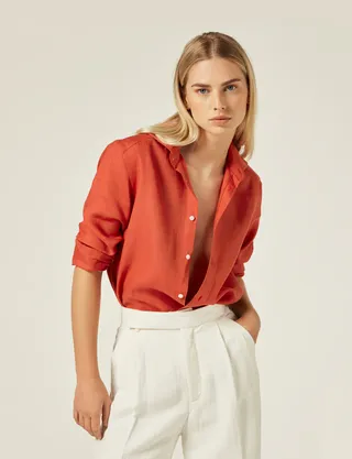 With nothing underneath, the boyfriend's linen shirt was Cardinal red