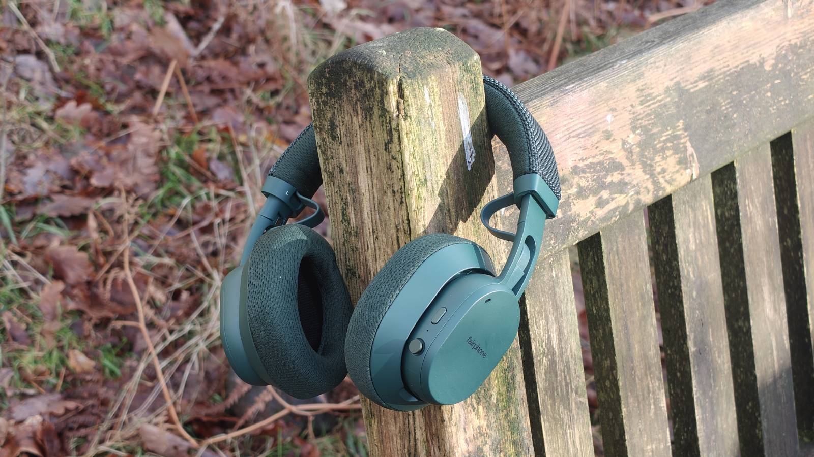 The Fairphone Fairbuds XL 2025 on a bench.