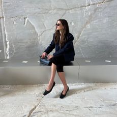 Senior Fashion Editor Eliza Huber wearing COS.