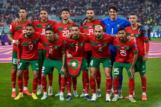 Morocco players line up ahead of their third-place match against Croatia at the 2022 World Cup.