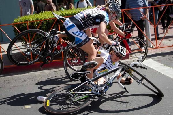 Ina-Yoko Teutenberg (HTC-Highroad) hits the deck and takes Lauren Tamayo with her after carrying too much speed into the hairpin turn. Both immdeiately rejoined the race.