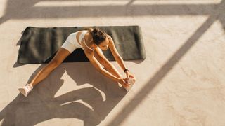 Iyengar yoga: A woman stretching