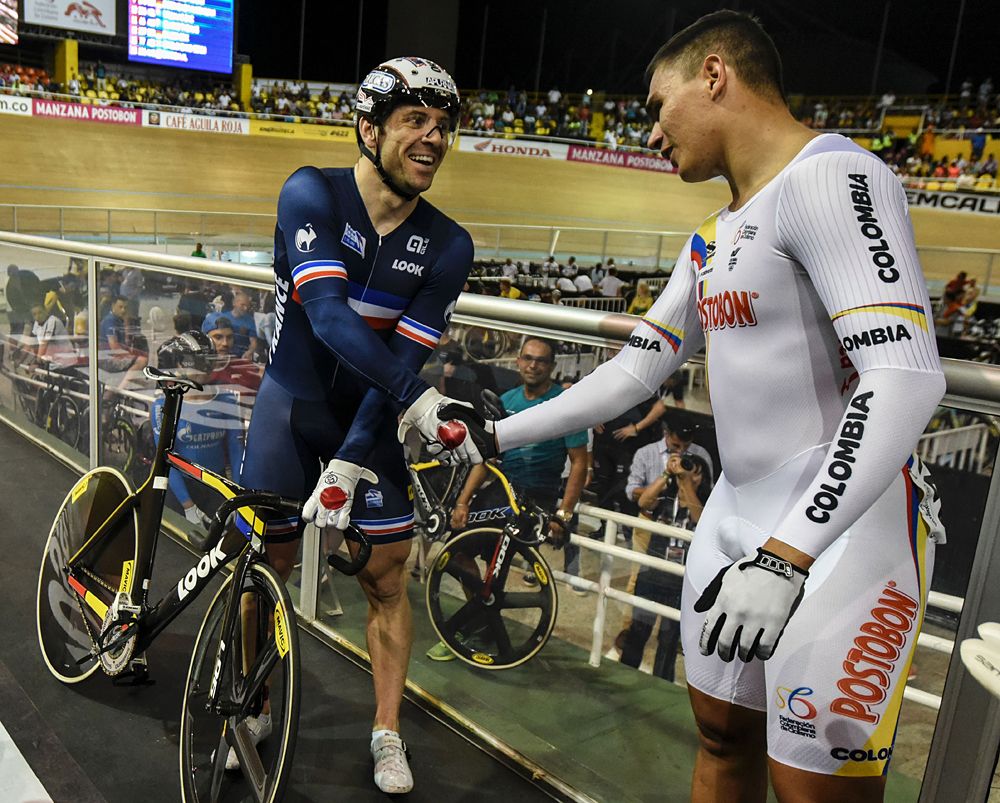 Francois Pervis (France) congratulates Colombian Fabian Puerta, who won the keirin