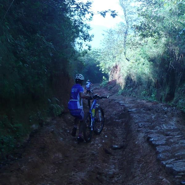 Some riders chose to run the slippery downhill.
