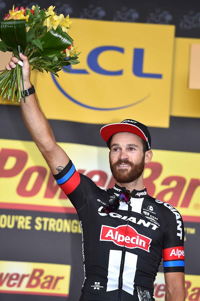 Simon Geschke on the stage 17 podium.