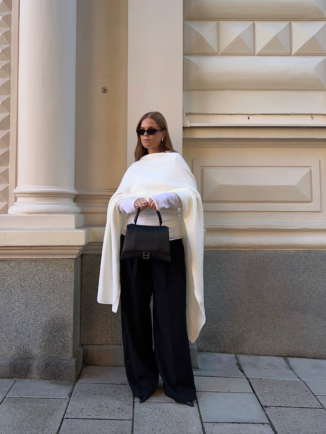 @haaannajohansson carries a Balenciaga top-handle bag