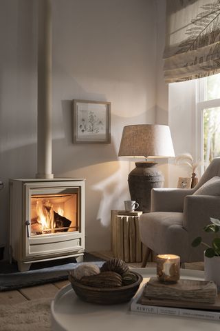 Cream living room with small cream fireplace