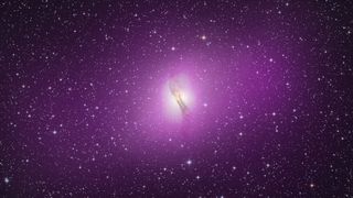 High-energy gamma-rays glow purple in this NASA image of a distant galaxy. Looking for purple-hued exoplanets may help scientists find signs of extreme alien life, new research suggests.