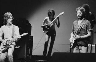 English guitarists Jeff Beck (left) and Eric Clapton performing in 'The Secret Policeman's Other Ball', at the Drury Lane theatre, London, 9th September 1981. The show is a benefit to raise funds for Amnesty International. (Photo by Michael Putland/Getty Images)