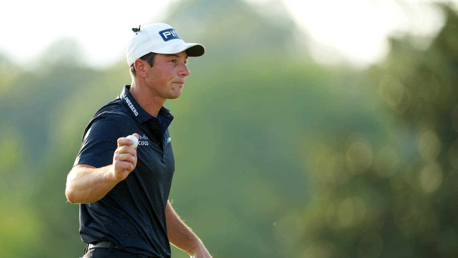 Viktor Hovland waves to the crowd