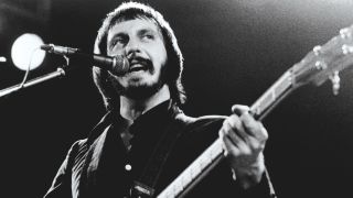 an image of john Entwistle on stage
