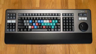 Blackmagic Davinci Resolve Editor Keyboard on a wooden surface