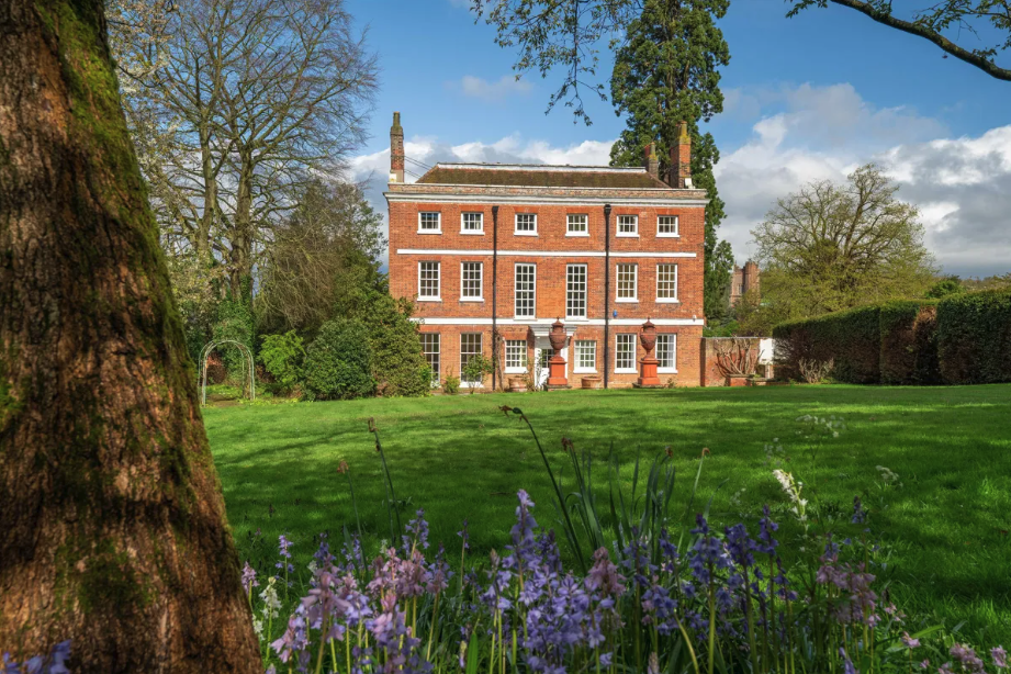 A front on view of the queen anne old vicarage