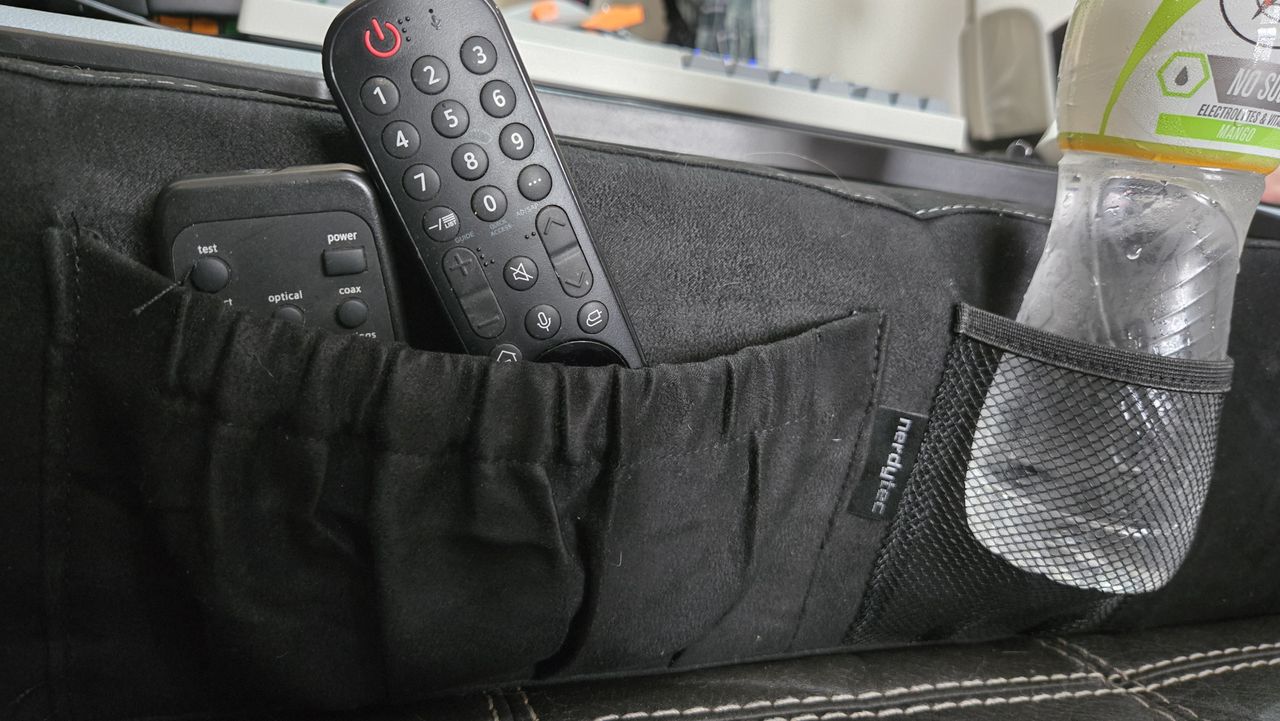 Couchmaster Cycon3 set-up on a sofa with a keyboard and mouse.