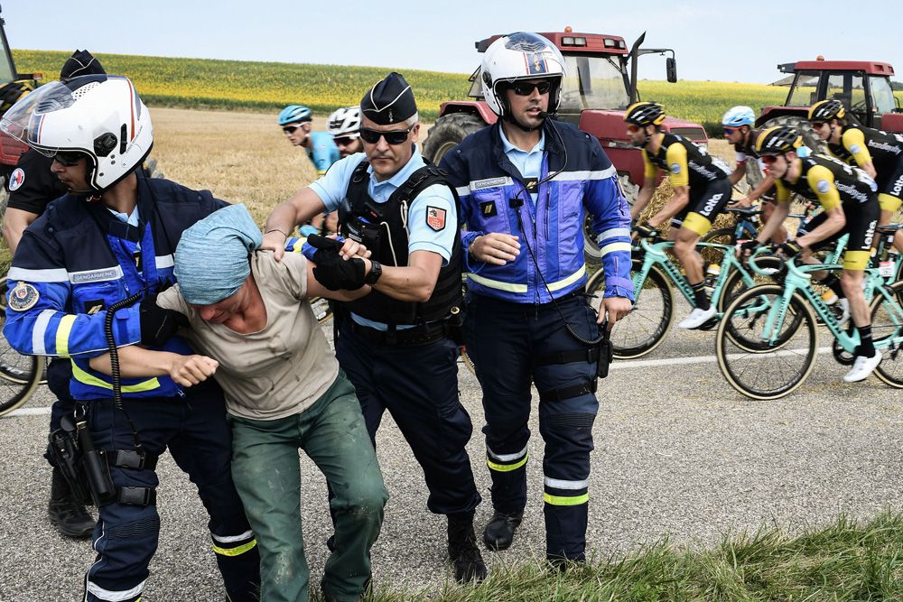 French police hold a protester