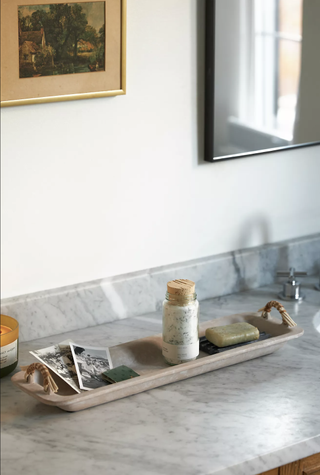 bathroom tray with products on it