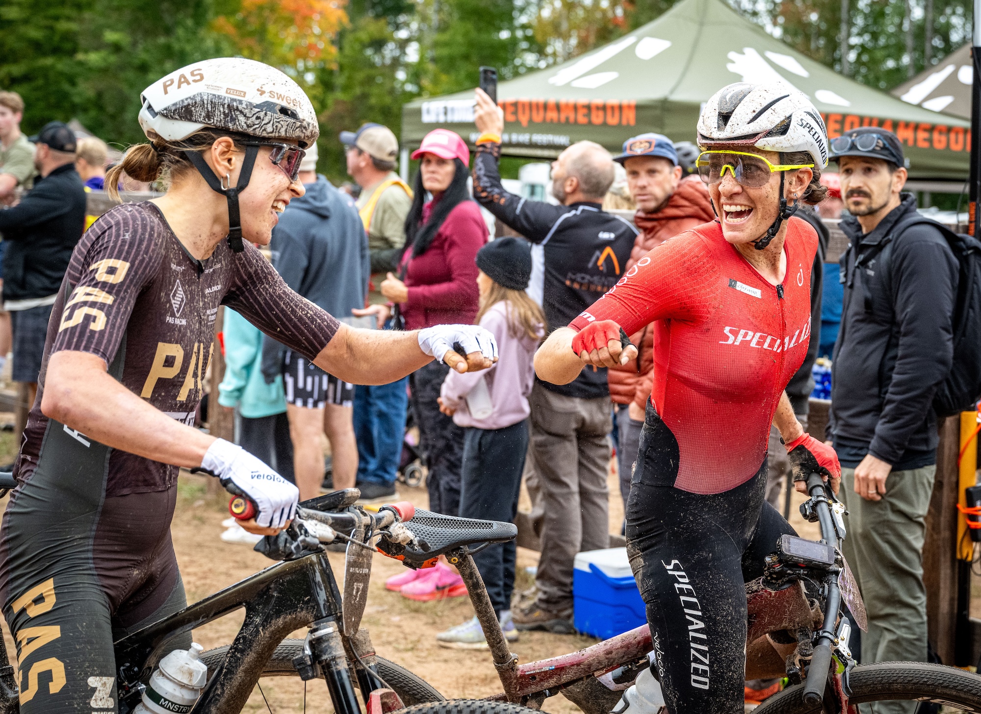 Sofia Gomez Villafa&amp;ntilde;e (right) extended her lead in the 2026 Life Time Grand Prix standings with the win at Chequamegon MTB, congratulating race runner-up Karolina Migo&amp;#324;, who was fourth in the Grand Prix