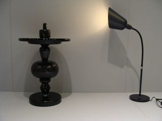 'Shuffle Table' and a floor standing lamp