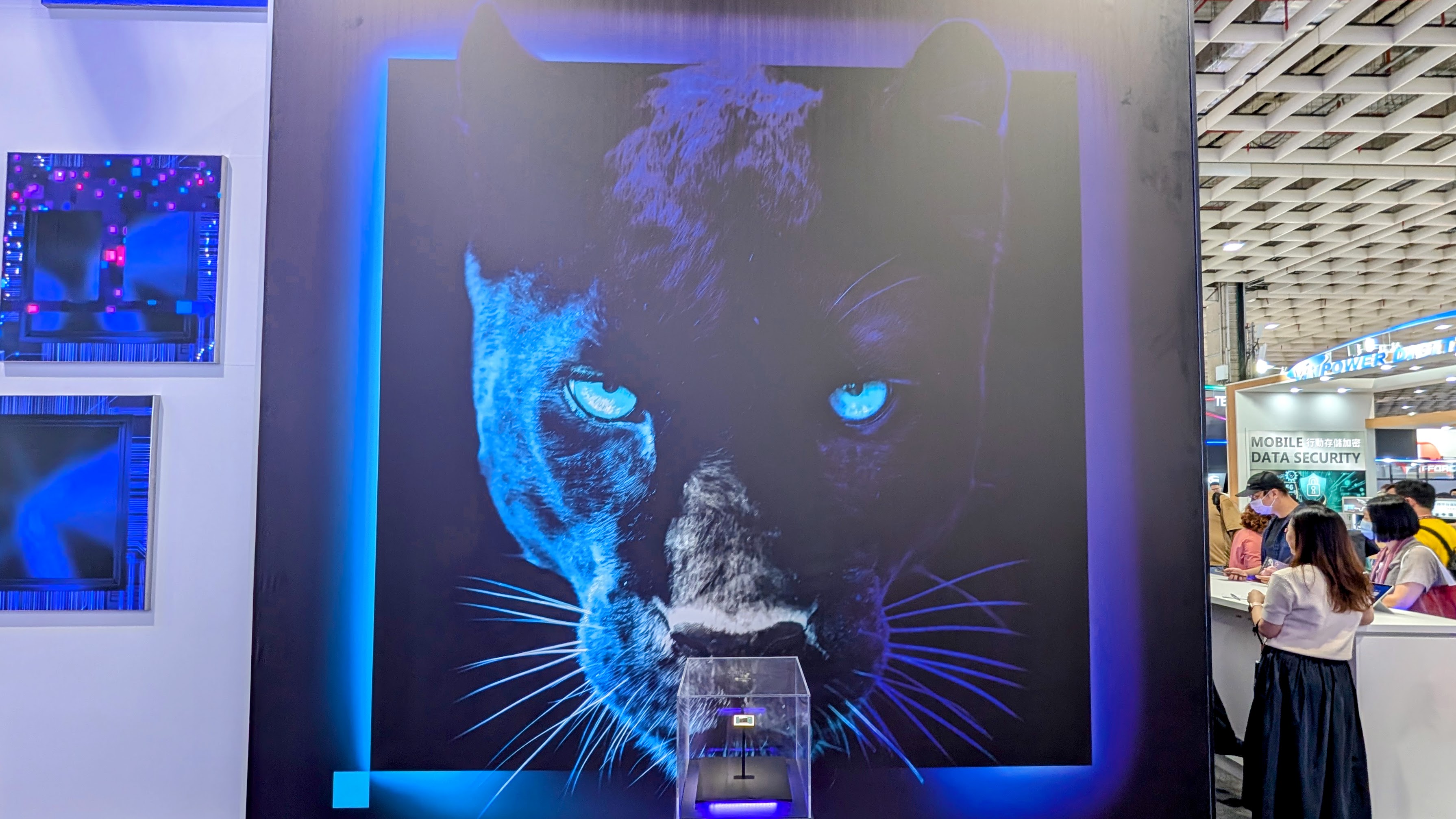 Intel Panther Lake wall sized poster of a panther and CPU on display Computex 2025