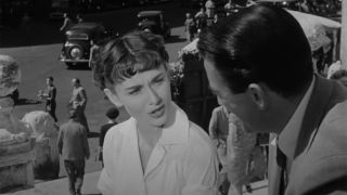 Screenshot of Audrey Hepburn and Gregory Peck in Roman Holiday.