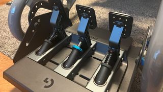 Logitech G Pro Racing Wheel's pedals from behind, showing the various springs and swappable parts to them.