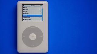An iPod Classic on a blue background