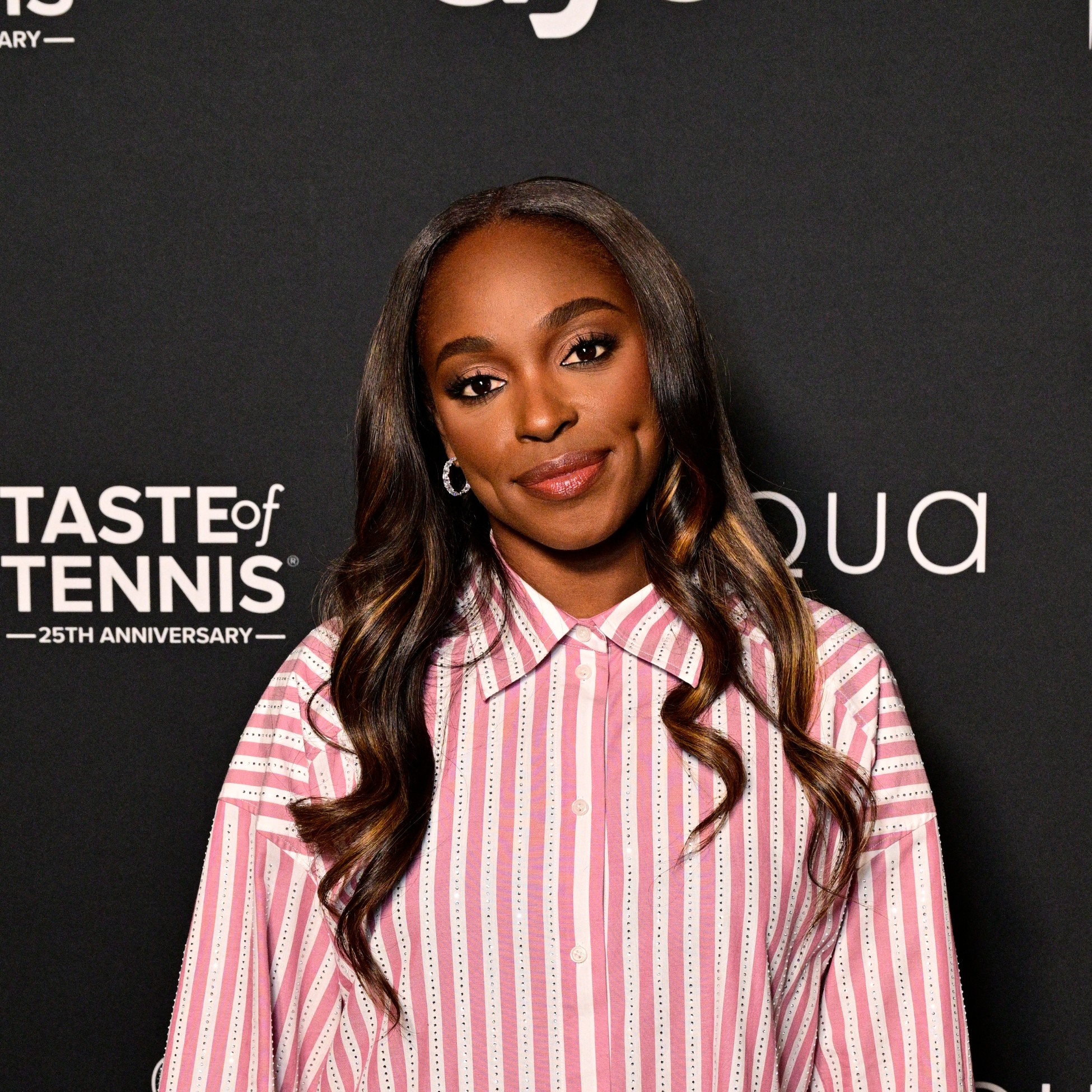 Sloane Stephens shows honey blonde highlights.