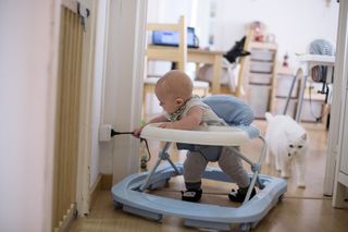 Baby pulling electricity cord