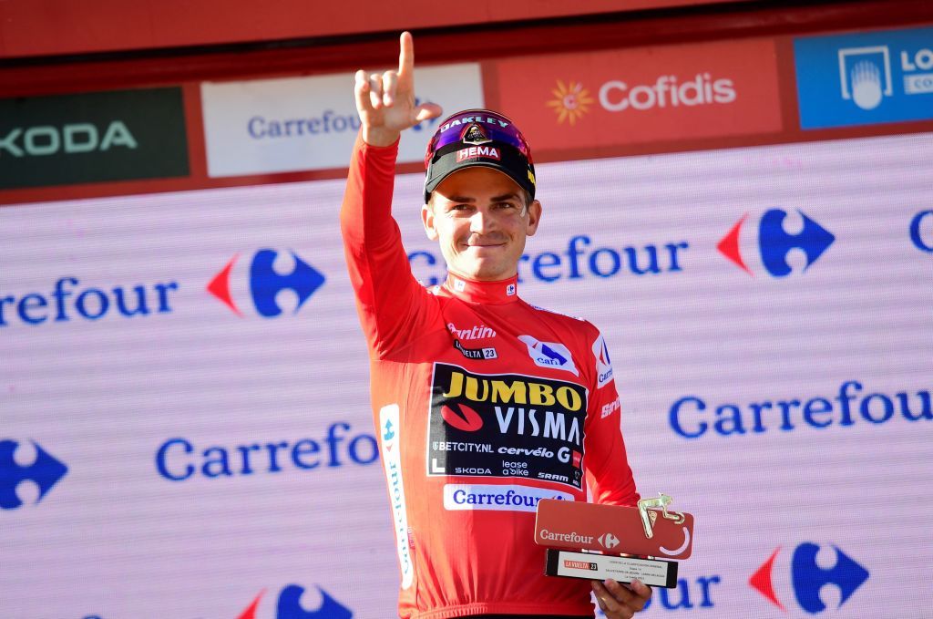 Team JumboVismas US rider Sepp Kuss wearing the overall leaders red jersey celebrates on the podium after the stage 14 of the 2023 La Vuelta cycling tour of Spain a 1562 km race between SauveterredeBearn and Larra Belagua on September 9 2023 Photo by Ander GILLENEA AFP Photo by ANDER GILLENEAAFP via Getty Images