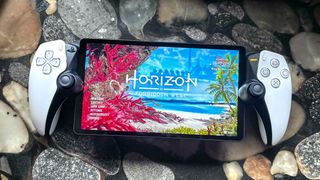The PlayStation Portal on a counter with the start screen for Horizon Forbidden West