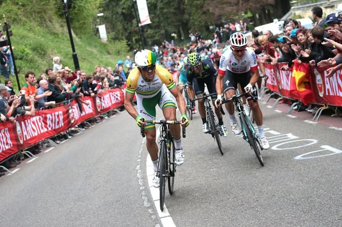 Gerrans tries to go after Gilbert, but it's too late
