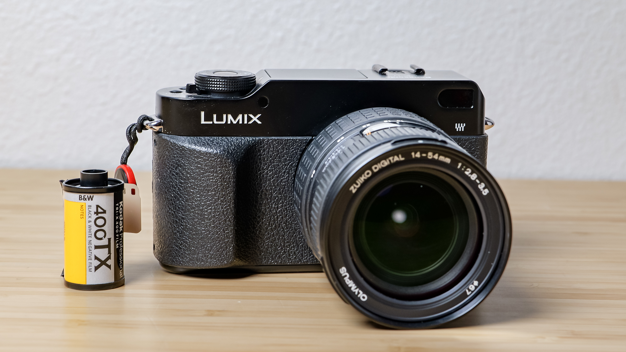 A photo of the Lumix L1 DSLR on a wooden surface