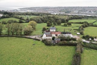 Aerial view of the site with the River Medina and Solent in the distance